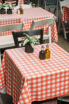 Outdoor Restaurant Table with Red Checkered Tablecloth