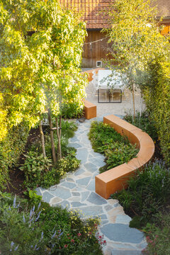 stylish garden pathway with vibrant greenery elements