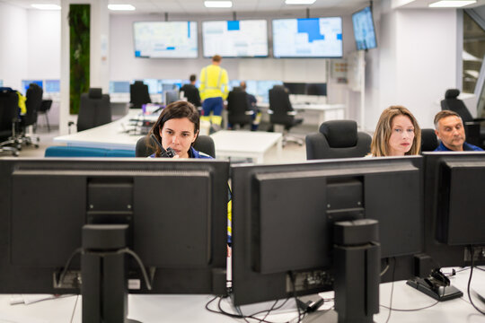 Control Room Staff Monitor Operations 