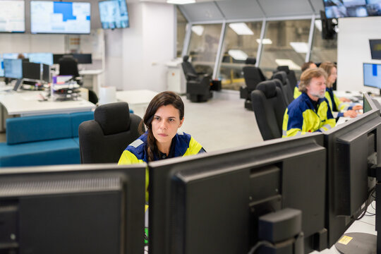 Control Room Staff Monitor Operations in a Waste Processing Facility