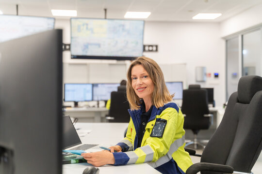 Operator Portrait At Desk In A Control Center 