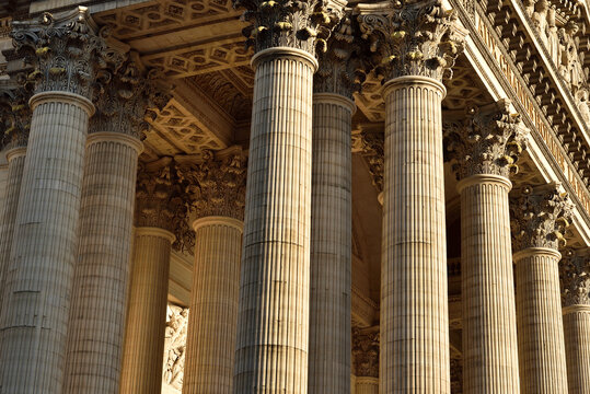 Horizontal view of strong marble columns at the Pantheon in Paris