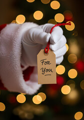 Extreme close-up of Santa Claus’s white glove 