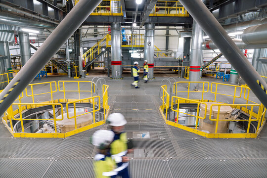 Energy Plant With Engineers and Equipment in Operation