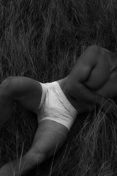 Man Reclining in Grass Serene Solitude Outdoor