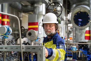 Skilled Worker Operating Machinery in Power Plant