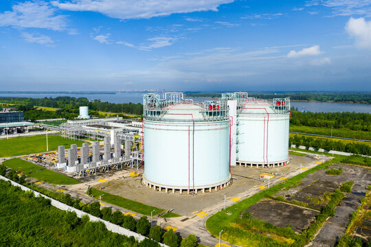 Aerial view of large LNG storage tanks in industrial plant