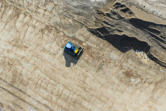 Aerial view of bulldozer working at construction site