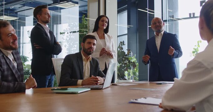 Confident leaders talk on business meeting, people speak to colleagues about schedule organization, tasks delegating in office. Colleagues team listening presentation, discussion at boardroom table