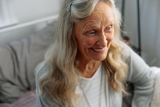 Elderly woman with a joyful expression 