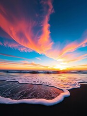 Fiery sunset paints the sky over a black sand beach, waves crash ashore,  coast, hawaii