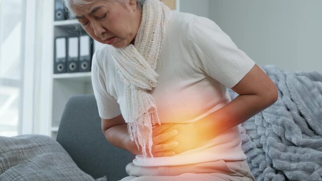 Managing Abdominal Pain Home Setting Health Awareness Comfortable Environment Close-Up View Natural Remedies