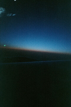 Abstract sky and horizon shot from plane window