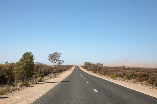 Dust storm on a rural road