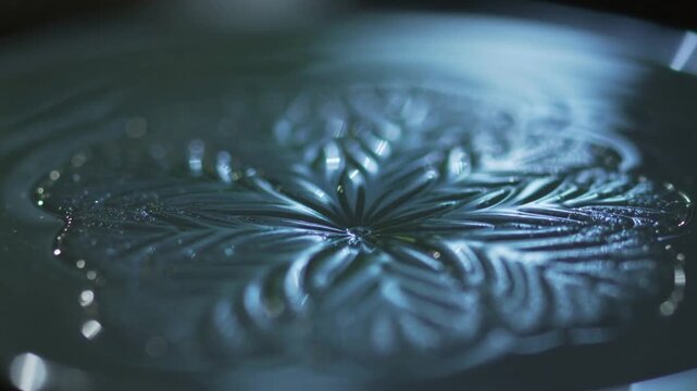 Mesmerizing Abstract Liquid Wave Patterns: Intricate Fluid Dynamics on a Vibrating Surface