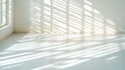 Obraz premium Bright shadows create tranquil atmosphere on white floor from window blinds