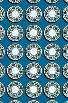 Flat lay traditional Turkish coffee plates arranged on blue 