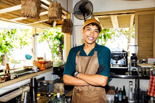 Smiling Barista Portrait in Cafe