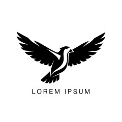 Obraz premium Graphic icon of a flying eagle or hawk in black silhouette, representing power, liberty, and vision for a modern company logo