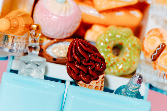 a chocolate ice cream toy cone inside a blue fridge