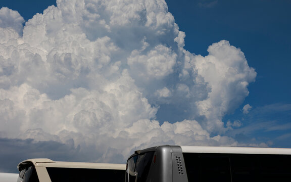 Blue Sky, White Clouds, and Modern Transportation.