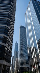 Naklejka premium Towering Skyscrapers Reach for the Sky in a Modern Urban Landscape.
