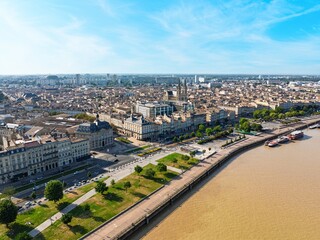 A drone shot showcases the beautiful cityscape of Bordeaux, France, highlighting its historic...