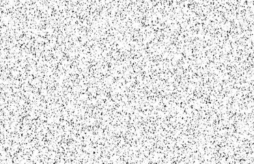Abstract pattern of black dots and lines on a white background creating a grunge textured effect