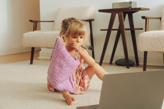 toddler using laptop 