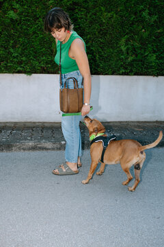 woman walking her dog 