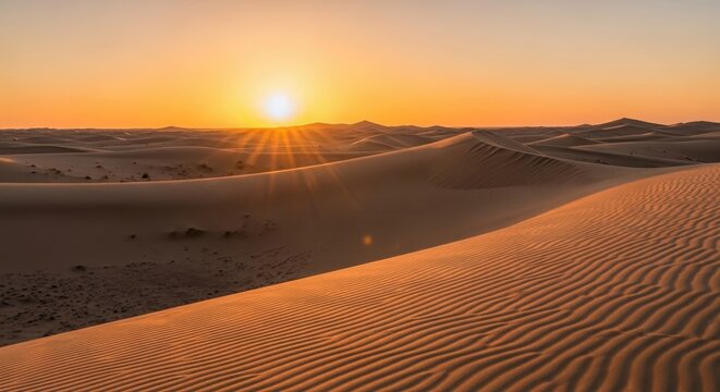 Golden hour bathes the undulating desert landscape in a warm, ethereal light creating a serene vista