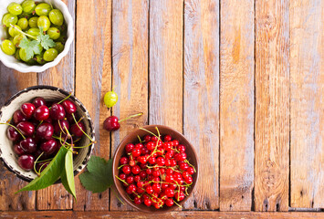 Various fresh berries in a bowls