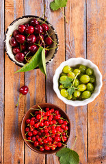 Various fresh berries in a bowls