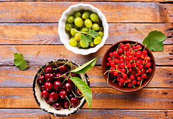 Various fresh berries in a bowls