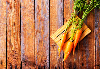carrots on a wooden background