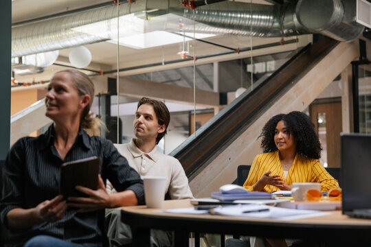 Team collaborating during an interactive office workshop