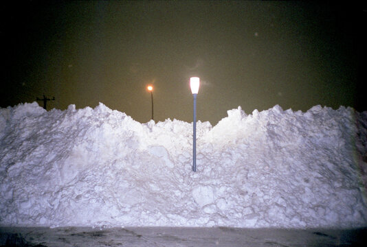 Street lights buried in the snow