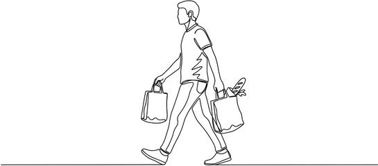 A man walking with shopping bags carrying groceries and a loaf of bread male person consumer retail purchase food commerce