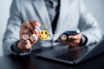 Customer satisfaction feedback with rating scale from sad to happy. Selected happy face with check mark. user review, service quality evaluation, and digital survey system.