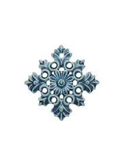 Ceramic toy in the form of a snowflake on a Christmas tree isolated on a white background. Handmade work.