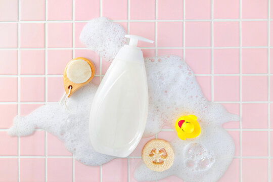 Bath time essentials with soap, bubbles, and a rubber ducky