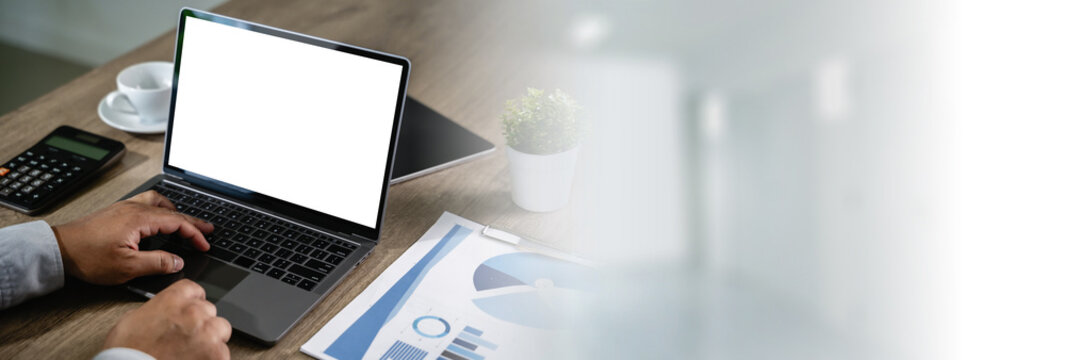 computer mock up blank screen using laptop with blank white copy space office interior - Powered by Adobe