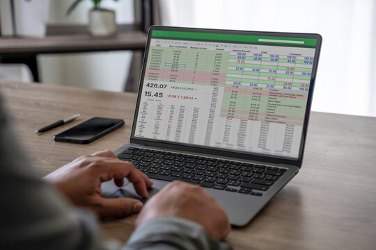 businessman working with data and graphs in spreadsheet documents for online analysis Microsoft Excel project dashboard accounting digital - Powered by Adobe
