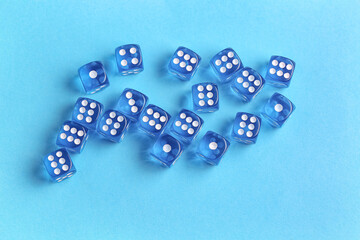 Blue game dices on color background