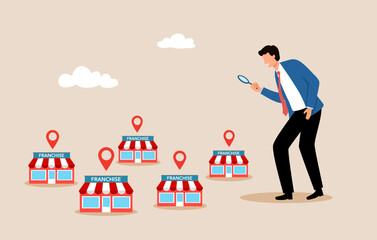Businessman holding magnifying glass for investment with small business or franchise branch expansion strategy of financial marketing planning.