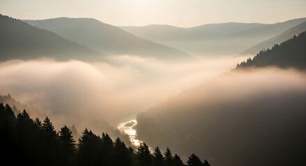 Misty mountain valley sunrise with river below