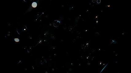 Dark abstract view with floating spots and light streaks - Powered by Adobe