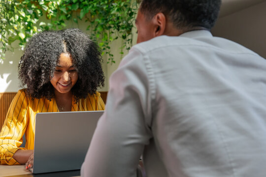 Two professionals engaged in a collaborative discussion