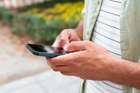 Close-Up of anonymous Hands Using Smartphone
