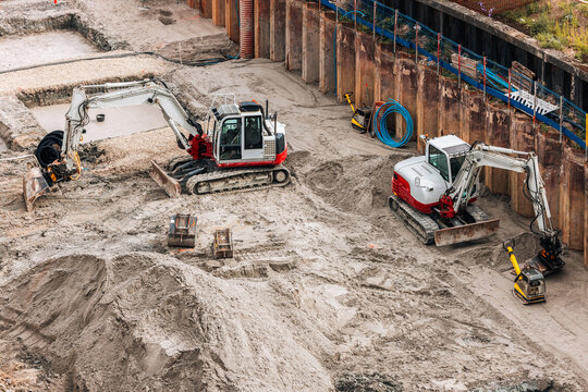 Excavators Working at Construction Site